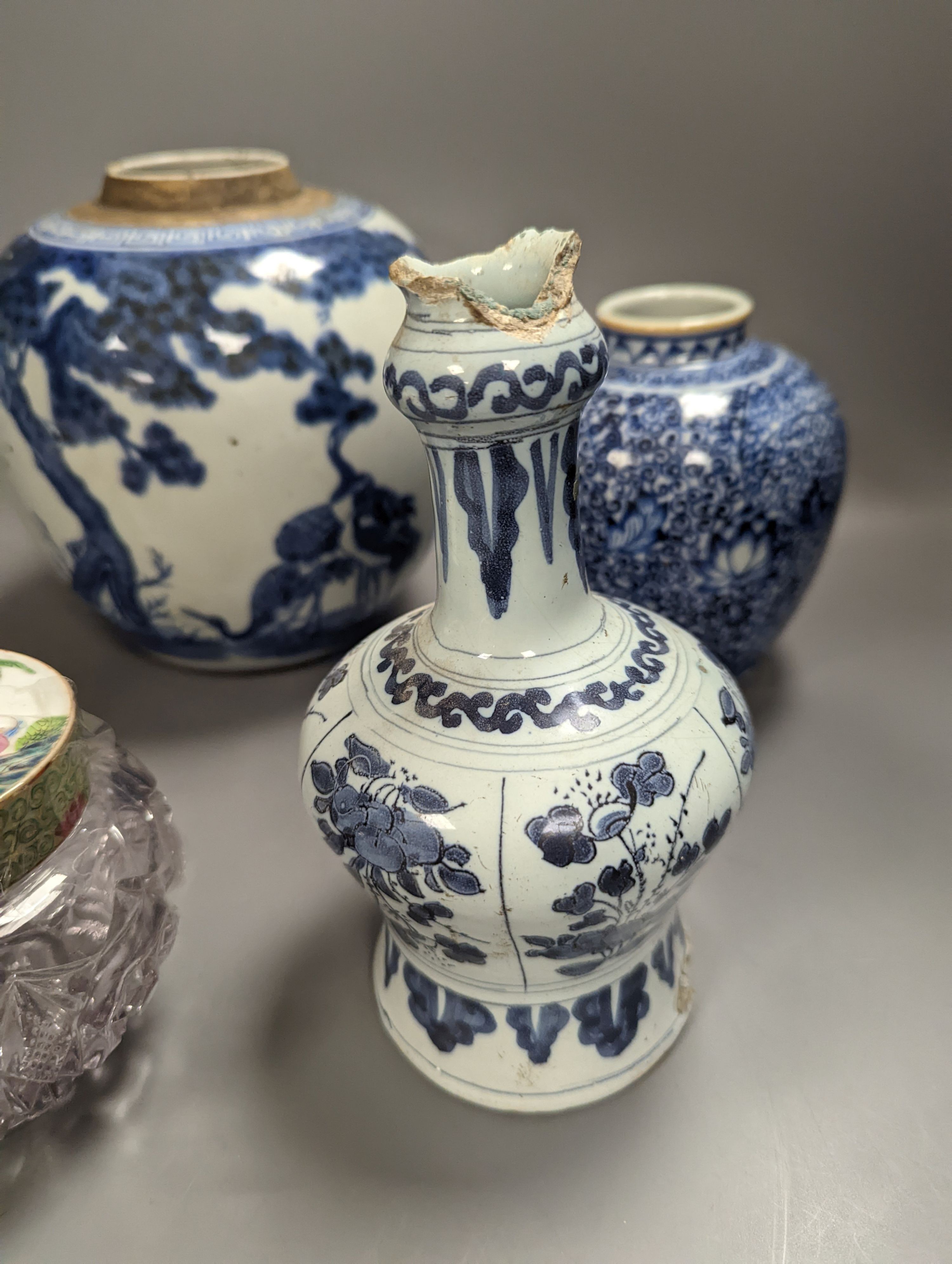 Four Chinese porcelain jars and a delft ware jar, 18cm and a pressed glass powder jar (a.f.)